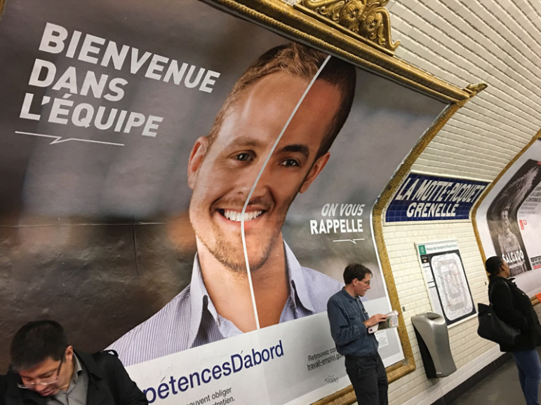 A jobs discrimination poster campaign poster can be seen in the metro in France. Photo courtesy of Eleanor Beardsley