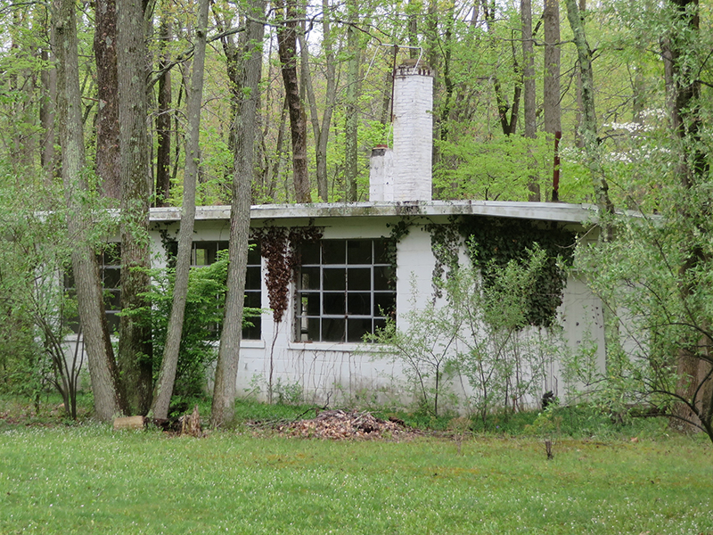 Ben Shahn’s deserted studio sits in the greenery a few feet behind the empty house where he lived for nearly half a century before his death in 1968. Religion News Service photo by Cathy Lynn Grossman