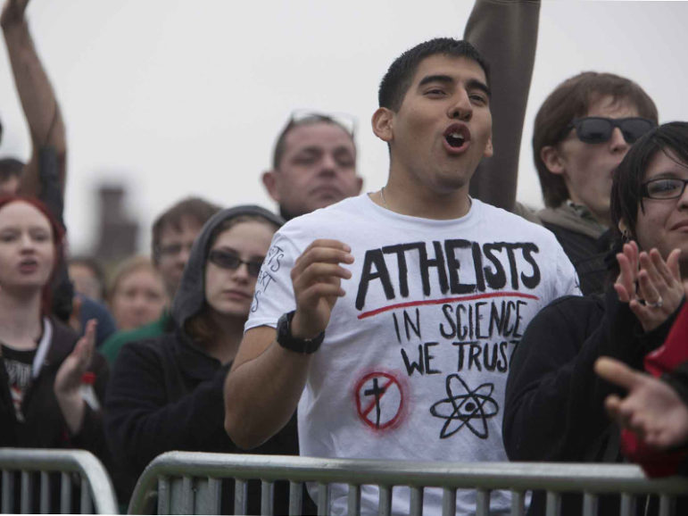Thousands of atheists and unbelievers, including Alberto Valdez from Del Rio, Texas, gathered in 2012 on the National Mall for the Reason Rally. RNS photo by Tyrone Turner 