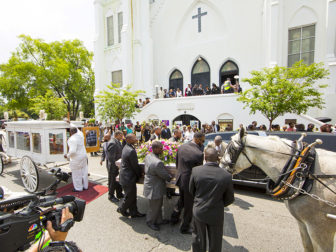 The casket of shooting victim Susie Jackson is brought into Emanuel AME Church for funeral services in Charleston, South Carolina on June 27, 2015. Photo courtesy of REUTERS/Jason Miczek *Editors: This photo may only be republished with RNS-CHARLESTON-ANNIVERSARY, originally transmitted on June 8, 2016.