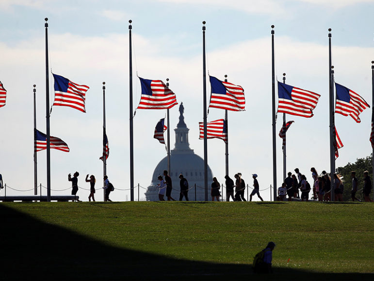 Flags at the Washington Monument fly at half-staff to honor those killed in the June 12, 2016 shootings at a gay club in Orlando, Fla., in Washington, D.C., on June 13, 2016. Photo courtesy of REUTERS/Kevin Lamarque
*Editors: This photo may only be republished with RNS-UDDIN-OPED, originally transmitted on June 13, 2016.
