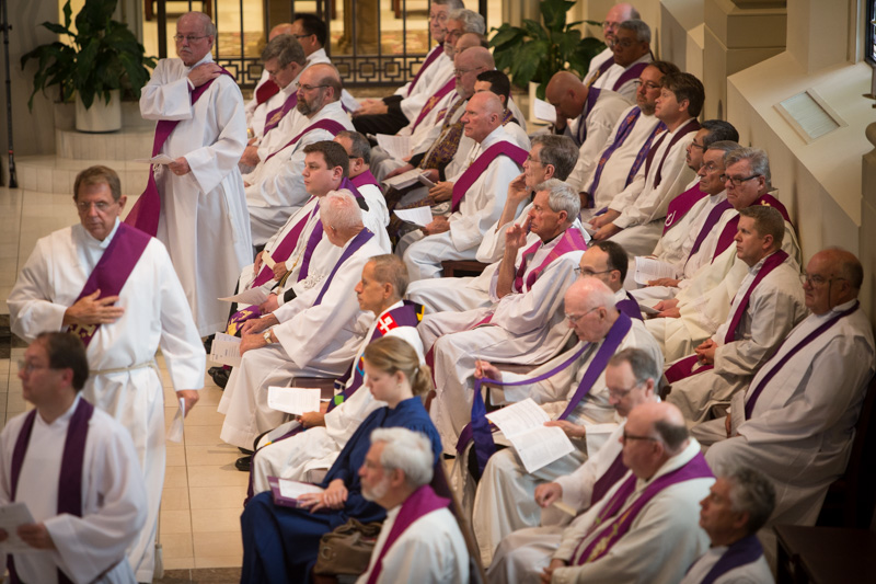 Priests and laymen submit prayers intentions during the Service of Lament at the Cathedral of the Immaculate Conception in downtown Kansas City, Mo., on June 26, 2016. RNS photo by Sally Morrow