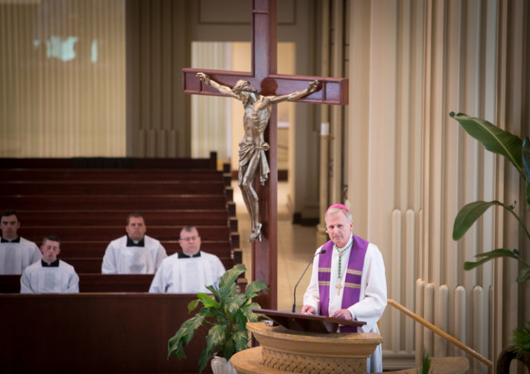 Bishop James V. Johnston Jr. of the Kansas City-St. Joseph Diocese, delivers a homily during the 