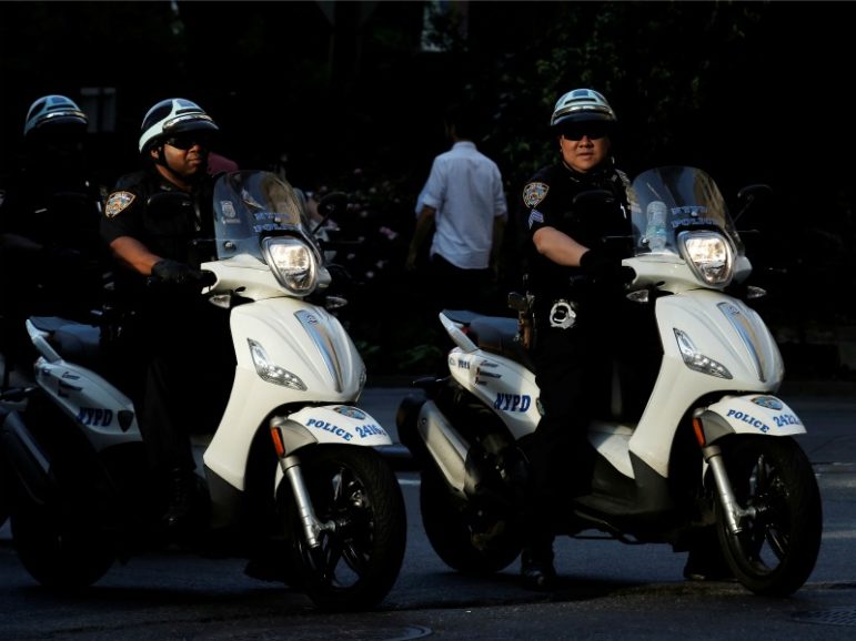 New York City Police Department officers ride scooters June 2, 2016, in lower Manhattan. Photo by Brendan McDermid/REUTERS