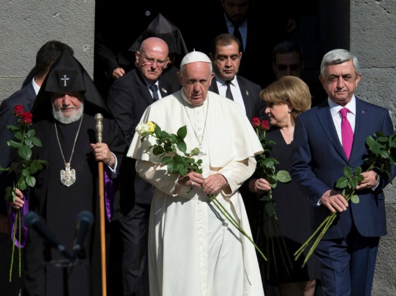 Pope Francis (center), Catholicos of All Armenians Karekin II (left) and Armenian President Serzh Sarksyan arrive for a ceremony in commemoration of Armenians killed by Ottoman forces during World War One at the Tzitzernakaberd Genocide Memorial June 25, 2016, in Yerevan, Armenia. Photo via Osservatore Romano/Handout