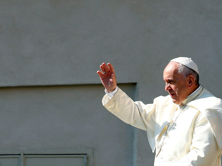Pope Francis waves as he arrives to lead his Wednesday general audience in St. Peter's Square at the Vatican on June 8, 2016. Photo courtesy of REUTERS/Tony Gentile
*Editors: This photo may only be republished with RNS-POPE-HERETICS, originally transmitted on June 9, 2016.