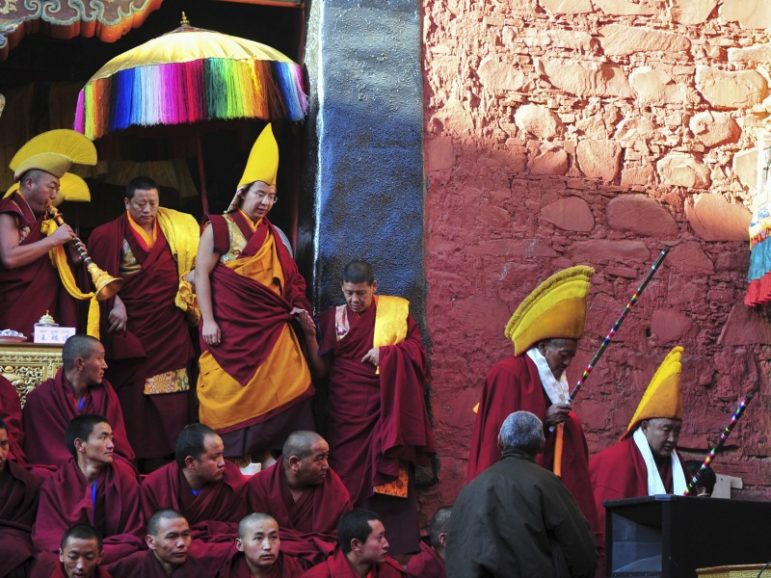 Gyaltsen Norbu (top, left), the 11th Panchen Lama, arrives at a Buddhism gathering Dec. 8, 2015, at the Tashilhunpo Monastery in Shigatse, Tibet Autonomous Region, China. China Daily/REUTERS