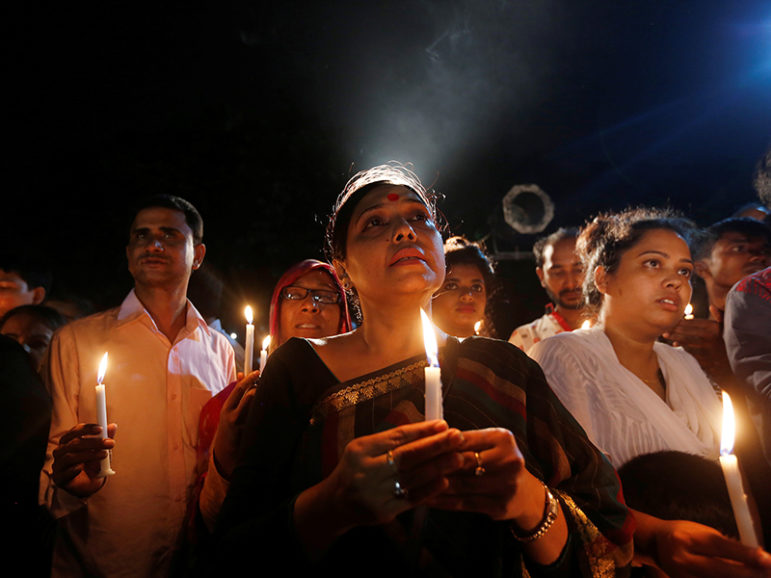 People attend a candle light vigil for the victims of the attack on the Holey Artisan Bakery and the O'Kitchen Restaurant, in Dhaka, Bangladesh, on July 3, 2016. Photo courtesy of REUTERS/Adnan Abidi
*Editors: This photo may only be republished with RNS-DAOUDI-OPED, originally transmitted on July 12, 2016.