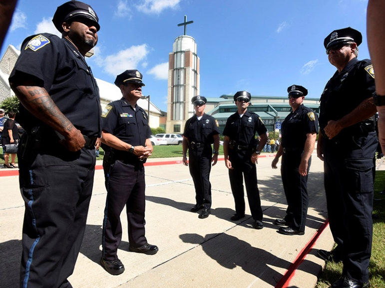 Police officers from New York City and Boston stand outside of Prestonwood Baptist Church as they attend the funeral of slain  Dallas Police Department Senior Corporal Lorne B. Ahrens in Plano, Texas, on July 13, 2016. Photo courtesy of REUTERS/Rex Curry 
*Editors: This photo may only be republished with RNS-DENNISON-OPED, originally transmitted on July 19, 2016.