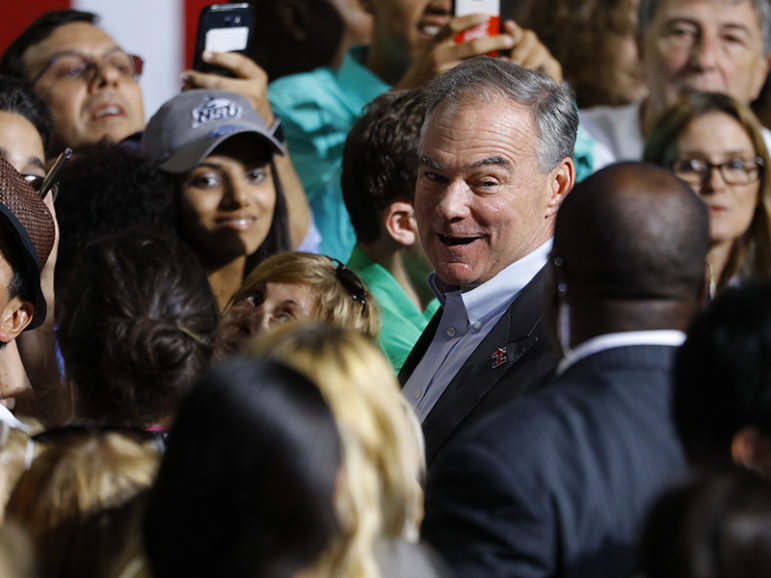 Democratic vice presidential candidate Sen. Tim Kaine, D-Va., greets the crowd after being publicly introduced by Democratic presidential candidate Hillary Clinton as her running mate during a campaign rally in Miami on July 23, 2016. Photo courtesy of REUTERS/Scott Audette