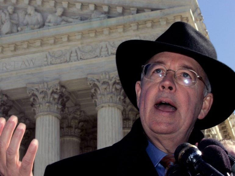 Kenneth Starr speaks to the media after arguing a case on student free-speech rights before the Supreme Court March 19, 2007, in Washington. Photo by Molly Riley/REUTERS/File Photo