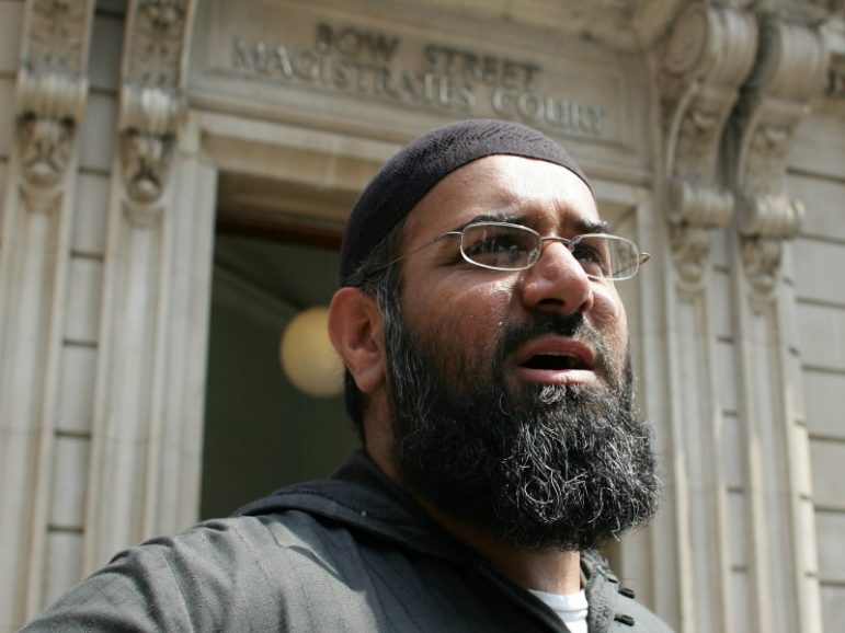 Anjem Choudary, the leader of the dissolved militant group al-Muhajiroun, arrives at Bow Street Magistrates Court in London July 4, 2006. REUTERS/Stephen Hird/Files