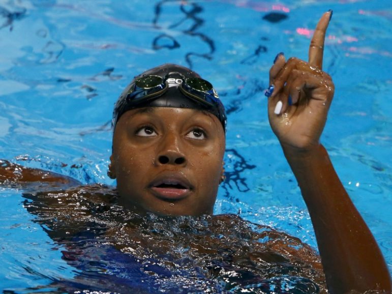 Simone Manuel of USA reacts after winning the gold and setting a new Olympic record Aug. 11, 2016, in Rio. Photo by Marcos Brindicci/REUTERS
