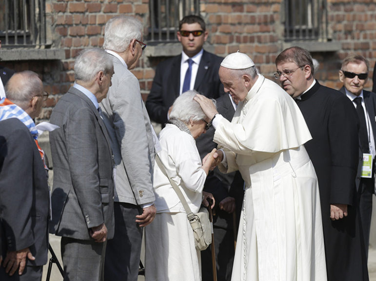 Pope Francis meets concentration camp survivors in the former Nazi German concentration and extermination camp Auschwitz-Birkenau in Oswiecim, Poland, July 29, 2016. Courtesy of REUTERS/David W Cerny