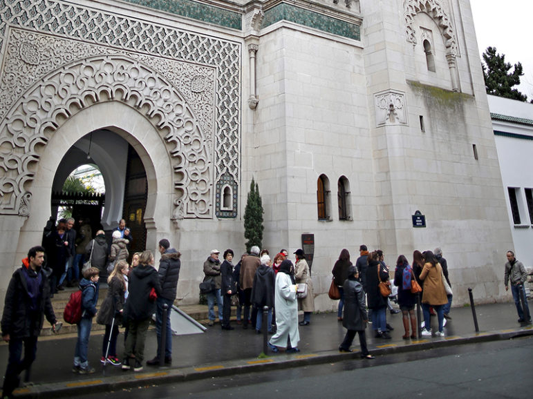 Visitors leave the Paris Grand Mosque during an open day weekend for mosques in France, on January 10, 2016. Photo courtesy of REUTERS/Charles Platiau