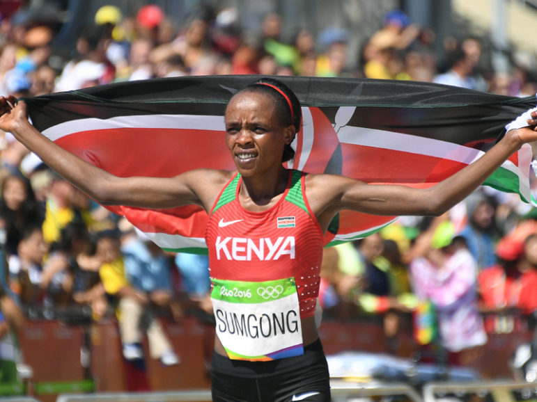 Jemima Sumgong of Kenya celebrates after winning the women's marathon in Rio de Janeiro on August 14, 2016. Photo courtesy of REUTERS/Johannes Eisele/Pool 
*Editors: This photo may only be republished with RNS-OLYMPICS-SUMGONG, originally transmitted on August 15, 2016.