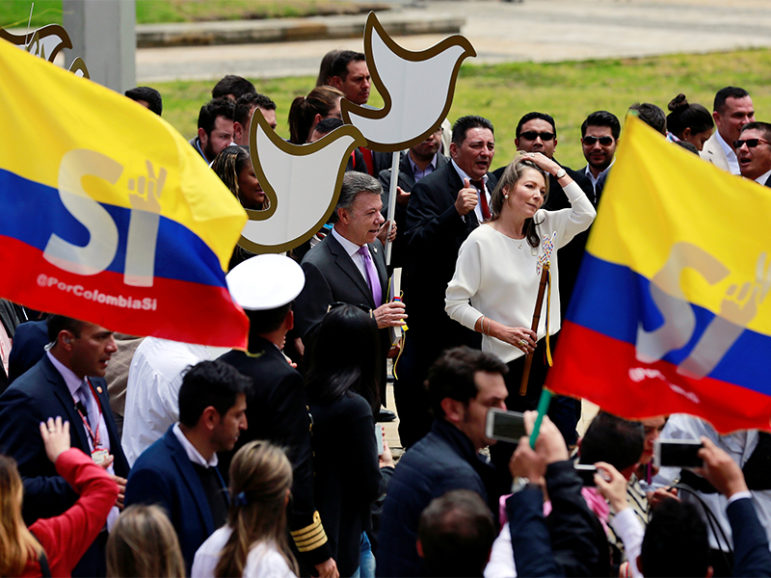 Colombian President Juan Manuel Santos, center left, and first lady Maria Clemencia de Santos arrive at the Colombian Congress in Bogota to present the FARC peace accord on Aug. 25, 2016. Photo courtesty of Reuters/John Vizcaino
