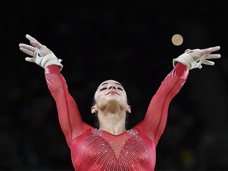 Aly Raisman competes on the vault during the women's individual all-around gymnastics final in Rio de Janeiro on Aug. 11, 2016. Photo courtesy of REUTERS/Dylan Martinez