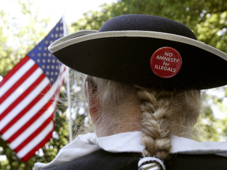 An anti-immigration rights supporter attends a rally in Washington on May 12, 2006. Photo courtesy of REUTERS/Jim Young 
*Editors: This photo may only be republished with RNS-SALKIN-OPED, originally transmitted on Aug. 25, 2016.