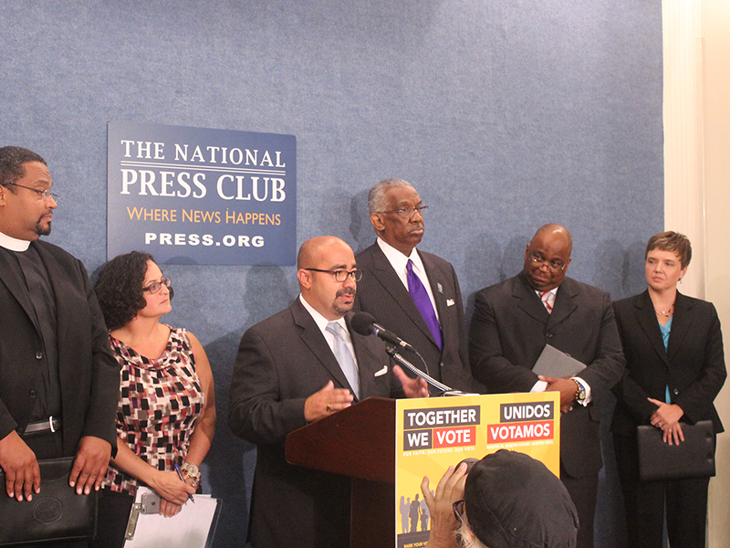 The Rev. Jose Arce of the National Latino Evangelical Coalition spoke at the “Together We Vote” news conference at the National Press Club on Aug. 2, 2016. He joined other faith leaders in plans to register people to vote. RNS photo by Adelle M. Banks