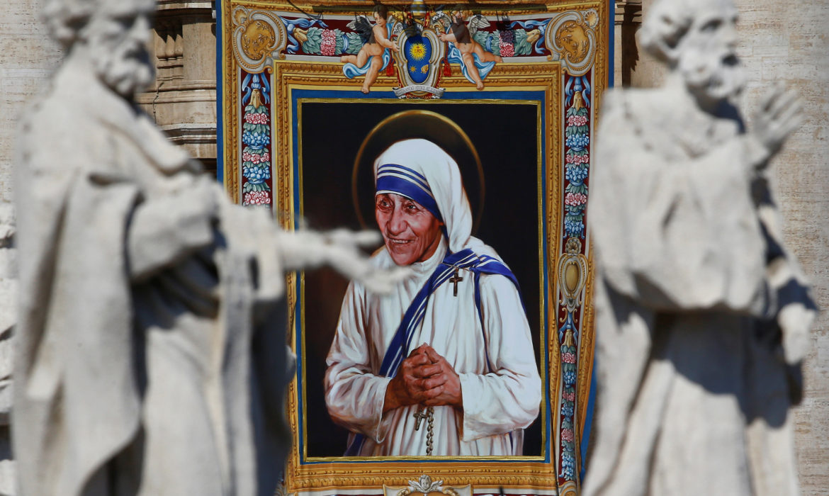 A tapestry depicting Mother Teresa of Calcutta is seen in the facade of Saint Peter's Basilica during a Mass, celebrated by Pope Francis, for her canonization in Saint Peter's Square at the Vatican on September 4, 2016. Photo courtesy of Reuters/Stefano Rellandini