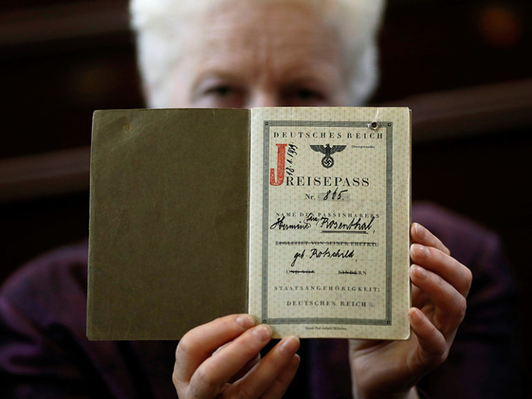 London Rabbi Julia Neuberger poses for a photograph with the old German passport of her grandmother, Hermine Sara Rosenthal, at the West London Synagogue in London, Britain September 20, 2016.  Courtesy of REUTERS/Stefan Wermuth