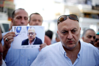 Majed Hattar, brother of the Jordanian writer Nahed Hattar, speaks to the media during a sit-in in town of Al-Fuheis
