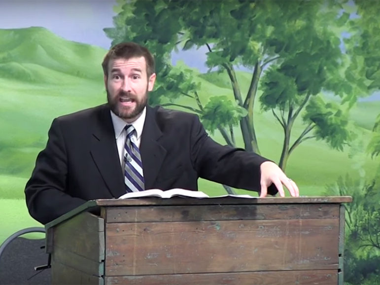 Faithful Word Baptist Church Pastor Steven Anderson talks about being prohibited from entering South Africa in a video sermon posted online on Sept. 12, 2016. Screenshot from YouTube video