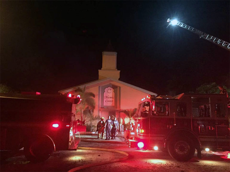 Emergency personnel respond to the Islamic Center of Fort Pierce, which was set on fire in Fort Pierce, Fla., on Sept. 12, 2016.  Photo courtesy of St. Lucie County Sheriff's Office/Handout via Reuters
