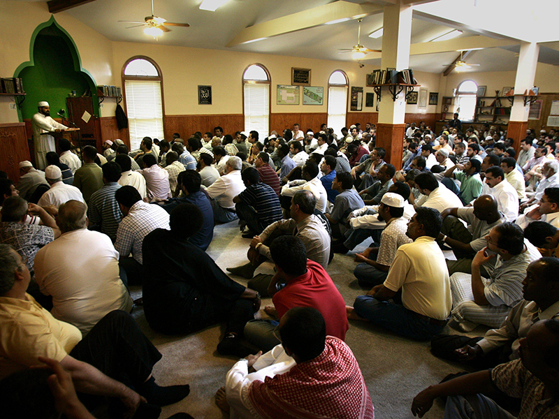 Imam Abdulhakim Mohamed delivers a message to the men of the Islamic Center of Nashville during a recent Friday afternoon. Photo by Larry McCormack, courtesy of The Tennessean via USA Today