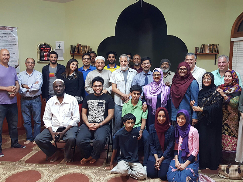Yusuf Islam/Cat Stevens, center standing, stopped by the Islamic Center of Nashville. The singer helped fund the formation of the 12South mosque. Photo courtesy of The Tennessean via USA Today