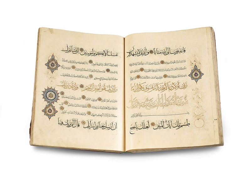A single -volume Quran attributed to the calligrapher Abdallah al –Sayrafi, copied in what is now Iran, probably around 1330 CE. The ink, color, and gold on paper manuscript is from the Museum of Turkish and Islamic Arts in Istanbul and is  on display at the Smithsonian’s Arthur M. Sackler Gallery. Photo courtesy of the Smithsonian