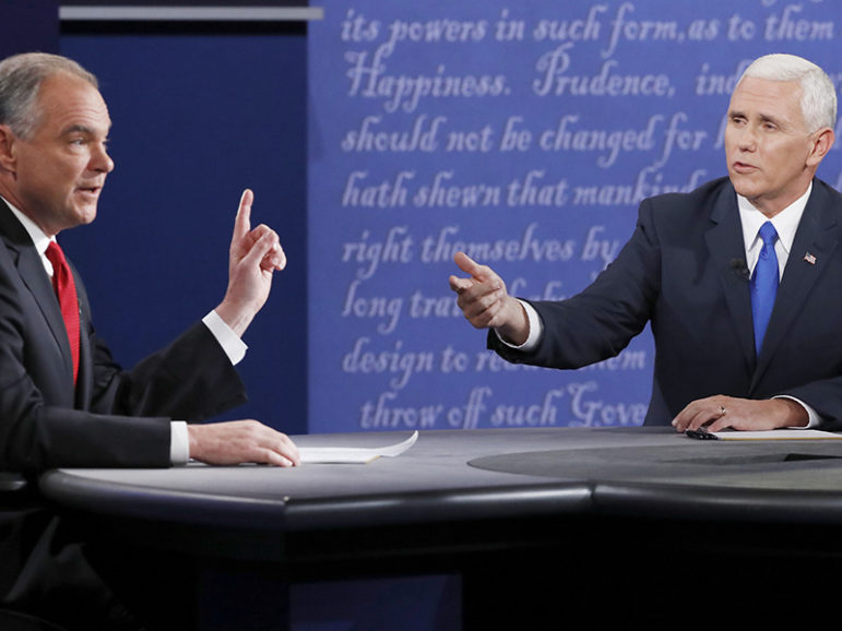 Democratic U.S. vice presidential nominee Senator Tim Kaine, left, and Republican U.S. vice presidential nominee Governor Mike Pence debate during their vice presidential debate at Longwood University in Farmville, Virginia, on October 4, 2016. Photo courtesy of Reuters/Jonathan Ernst