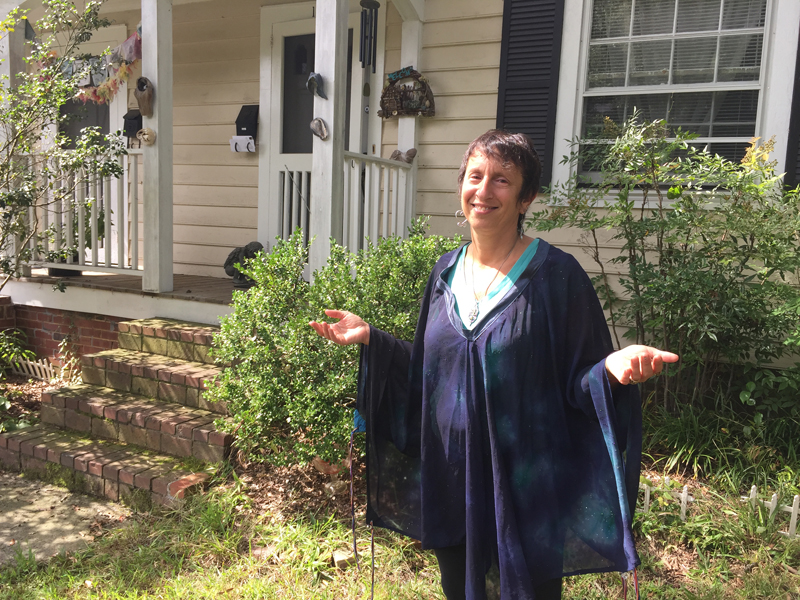 Rinah Rachel Galper, an ordained Jewish priestess, stands outside her home in Durham, N.C. RNS photo by Yonat Shimron