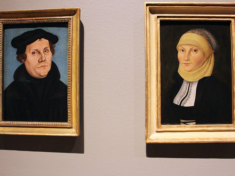 Portraits of Martin Luther and his wife Katharina von Bora hang in the exhibition 