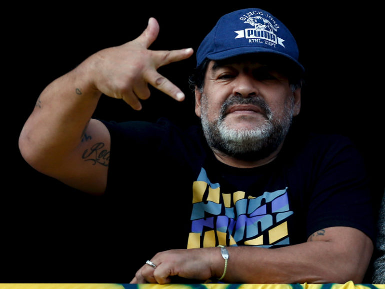Former Argentine soccer player Diego Maradona gestures from a balcony as he attends the Argentine First Division soccer match between Boca Juniors and Quilmes at La Bombonera stadium in Buenos Aires on July 18, 2015. Photo courtesy of Reuters/Marcos Brindicci 
*Editors: This photo may only be republished with RNS-POPE-MARADONA, originally transmitted on Oct. 11, 2016.