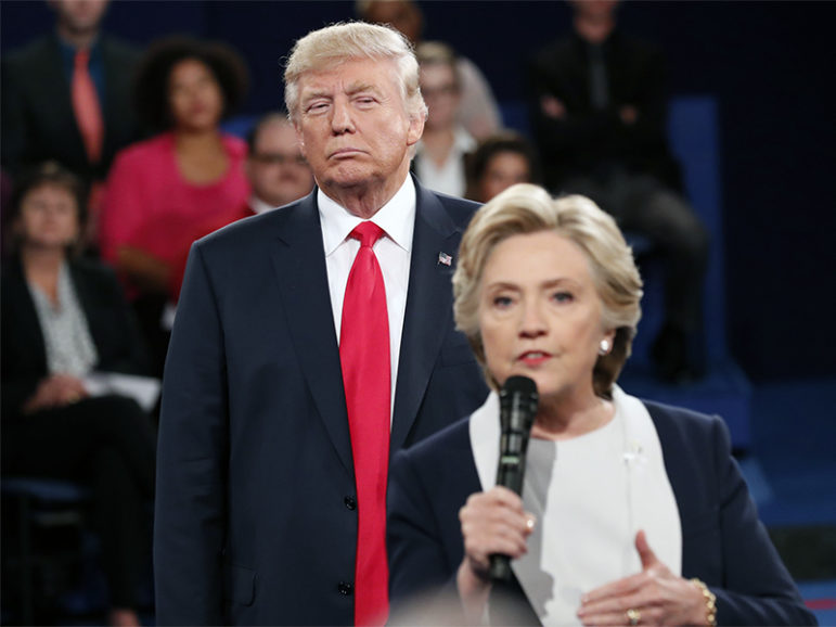 Republican U.S. presidential nominee Donald Trump listens as Democratic nominee Hillary Clinton answers a question from the audience during their presidential town hall debate at Washington University in St. Louis, MO, on October 9, 2016. Photo courtesy of REUTERS/Rick Wilking *Editors: This photo may only be republished with RNS-TRUMP-CHRISTIANS, originally transmitted on October 10, 2016.