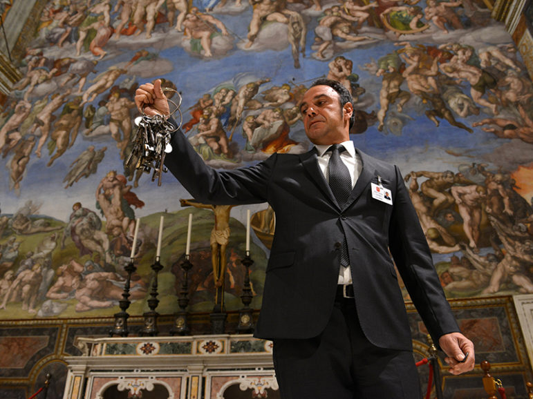 Gianni Crea, chief key keeper at the Vatican, in the Sistine Chapel with the bunch of keys he uses to access all rooms in the museum, on Oct. 6, 2016. Photograph by Chris Warde-Jones