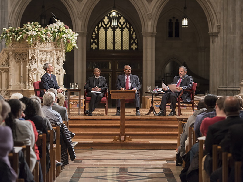 Washington National Cathedral held a discussion on its windows honoring Confederate generals on Oct. 26, 2016. Speakers, from left to right, are Civil War scholar John Coski, the Rev. Kelly Brown Douglas of the cathedral, Rex Ellis of the National Museum of African American History and Culture and moderator Ray Suarez. Photo courtesy of Danielle Thomas/Washington National Cathedral