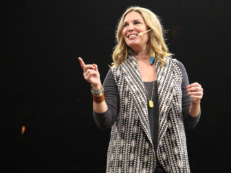Author, speaker and star of HGTV's "My Big Family Home Renovation" Jen Hatmaker speaks on Oct. 21, 2016, at the Belong Tour stop at the Xcel Energy Center in St. Paul, Minn. RNS photo by Emily McFarlan Miller