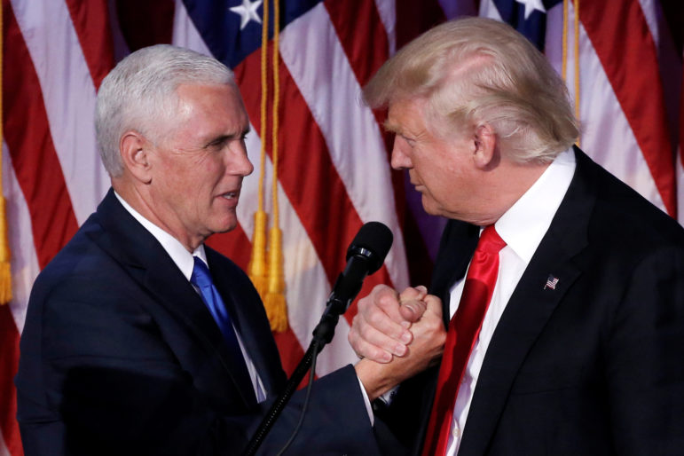 President-elect Donald Trump, right, and Vice President-elect Mike Pence embrace at their election-night rally in New York City. Photo courtesy of Reuters/Mike Segar