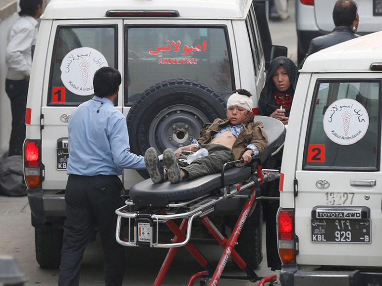 An injured boy is transported to a hospital after a suicide attack in Kabul, Afghanistan, on Nov. 21, 2016. Courtesy of REUTERS/Mohammad Ismail