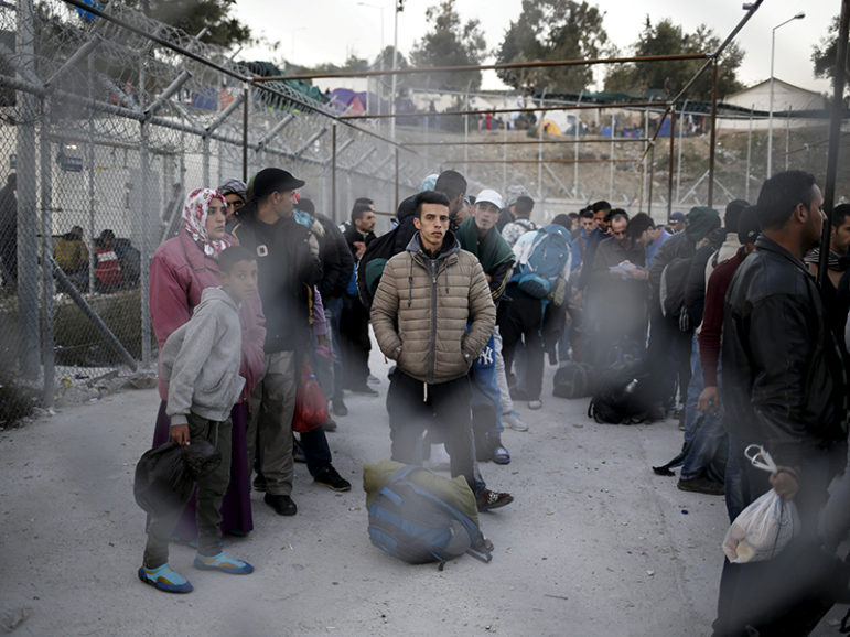Refugees and migrants wait to be registered at the Moria refugee camp on the Greek island of Lesbos, on November 5, 2015. Photo courtesy of Reuters/Alkis Konstantinidis/File Photo