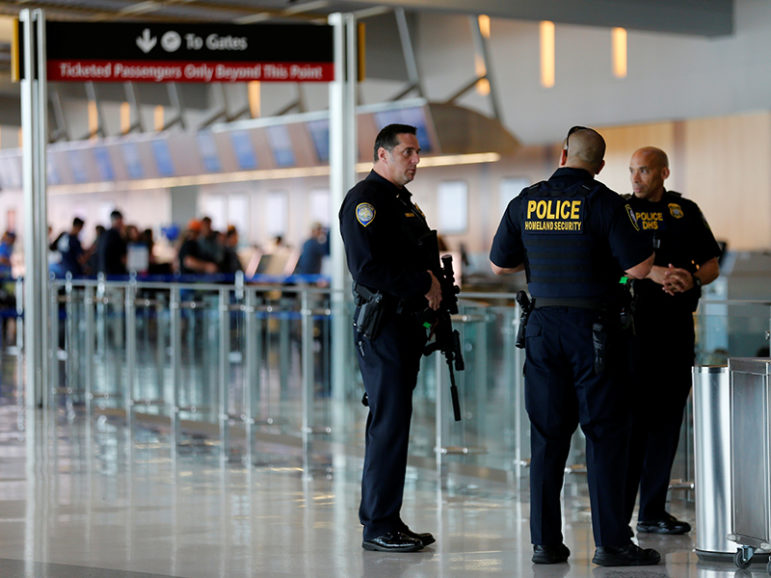 A San Diego Harbor police officer chats with Homeland Security officers while on patrol at Lindbergh Field airport in San Diego, Calif., on July 1, 2016. Photo courtesy of Reuters/Mike Blake
*Editors: This photo may only be republished with RNS-MUSLIM-REGISTRY, originally transmitted on Nov. 22, 2016.