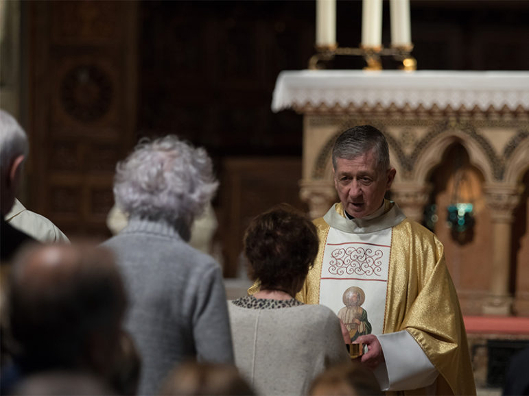 Chicago Cardinal Blase Cupich gives Holy Communion during a mass. Photo courtesy of Catholic Extension Society/Rich Kalonick