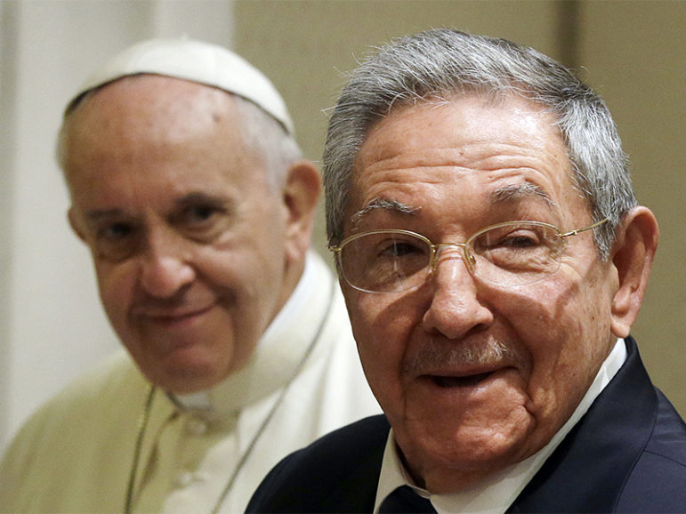 Cuban President Raul Castro, right, smiles as he meets Pope Francis during a private audience at the Vatican on May 10, 2015. Photo courtesy of REUTERS/Gregorio Borgia/pool