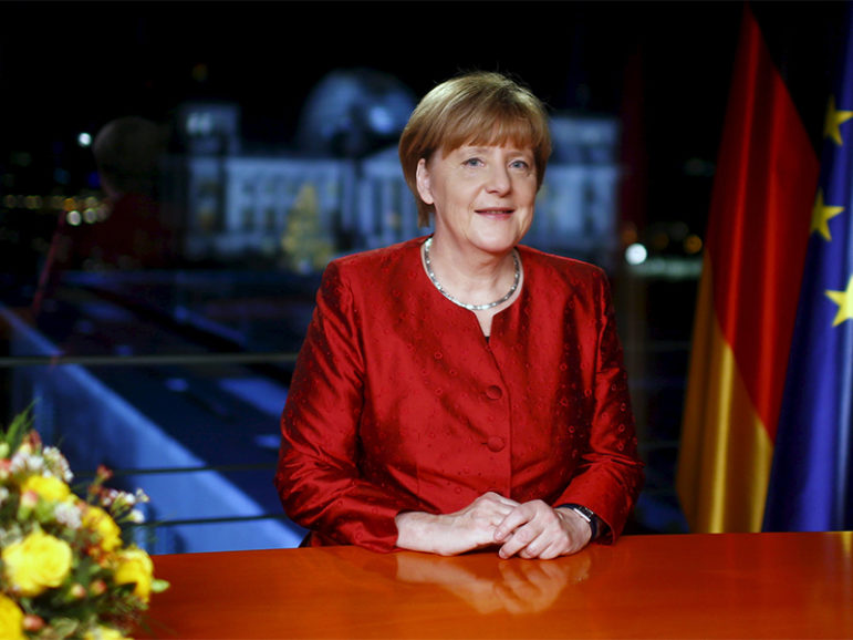 German Chancellor Angela Merkel poses after recording her New Year's speech in the Chancellery in Berlin, Germany, on December 30, 2015. Photo courtesy of Reuters/Hannibal Hanschke