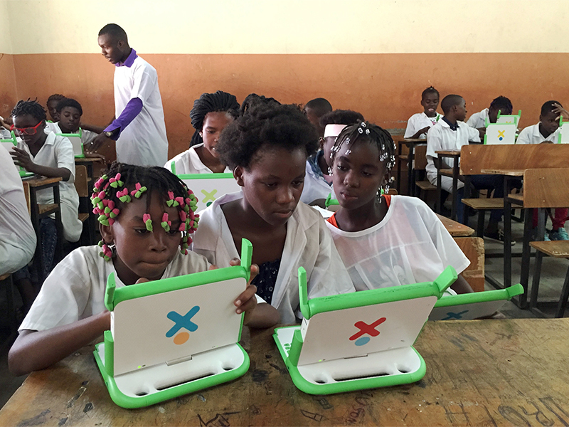 Children work on laptops provided by Angola's sovereign wealth fund at a Dom Bosco Catholic mission school in Luanda's impoverished Sambizanga neighbourhood, in Angola on June 7, 2016. Photo courtesy of Reuters/Ed Cropley
