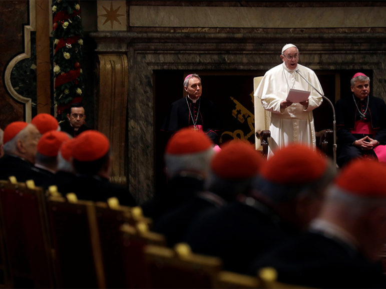Pope Francis speaks during the traditional greetings to the Roman Curia in the Sala Clementina (Clementine Hall) of the Apostolic Palace, at the Vatican on Dec. 22, 2016. (AP Photo/Gregorio Borgia, Pool)