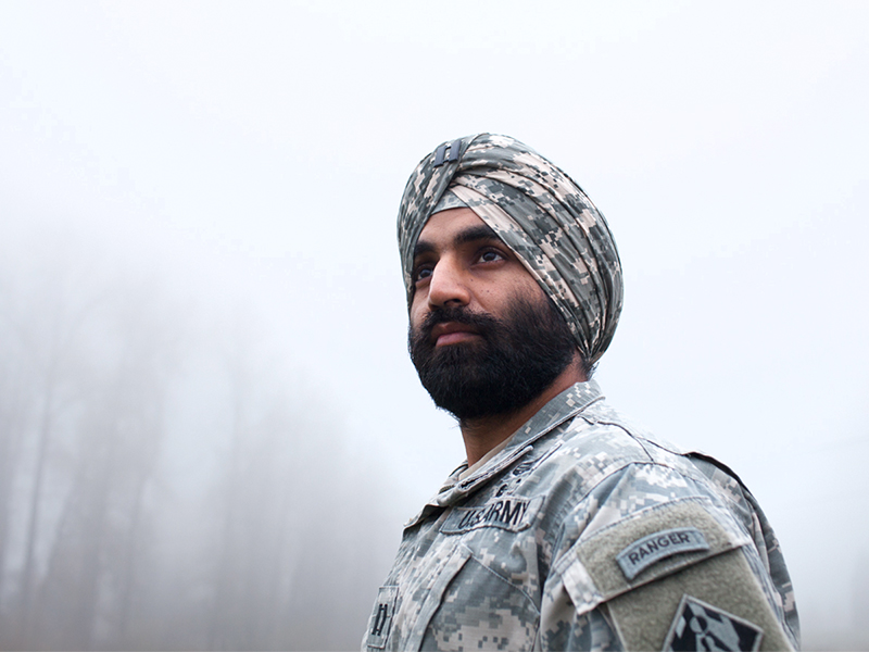 West Point graduate, Bronze Star Medal recipient, and Sikh soldier Captain Simratpal Singh, in his military uniform with the approved religious accommodations of turban and beard. Photo courtesy of Becket Law